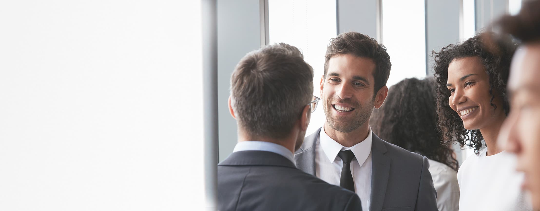 Group,Of,Businesspeople,Having,Informal,Office,Meeting